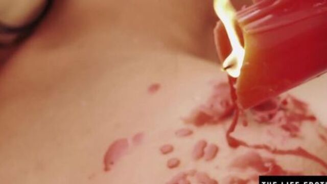 These gorgeous lesbians enjoy hot wax play while licking pussy