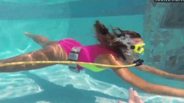 Cute teen Irina Poplavok swims naked underwater