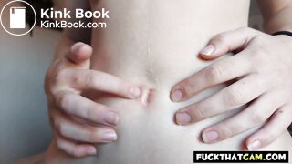 Redhead babe fingers her belly button