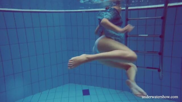 Sexy tight teen Marusia swims naked underwater