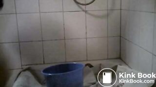 chubby gay guy smearing poop from a tub