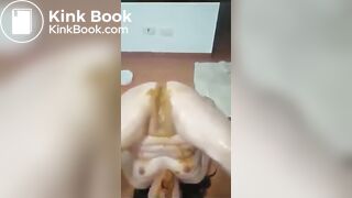 Chubby Asian girl shits on her pussy