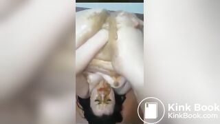 Chubby Asian girl shits on her pussy