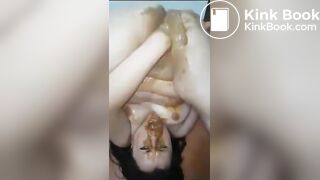 Chubby Asian girl shits on her pussy