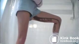 Diarrhea in shorts runs down her leg