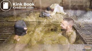 The Dirty Dung Business gay couple in cowshit