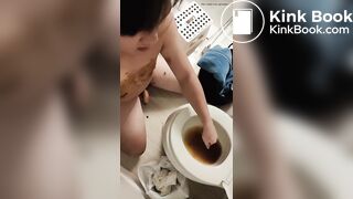 asian pulls shit from toilet and smears eats