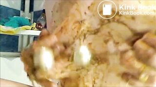 woman smearing shit on boobs