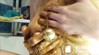 woman smearing shit on boobs