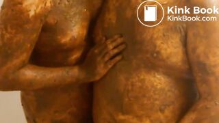 two shit covered gay guys hugging