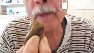 old man eating poop