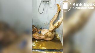Satan slave takes a scat session during enema