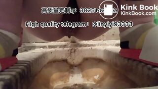 Beautiful girl poops in the toilet
