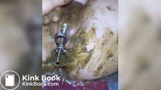 wretchedCunt being filled with shit like a pig