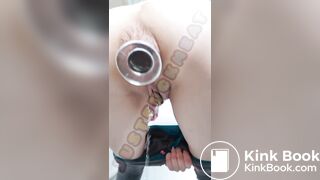 Pierced pussy and plugged arse pissing