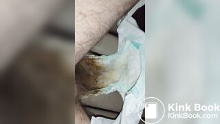 Hairy femboy opens messy diaper and begins to mast