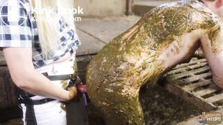 Mistress Marlena Dominating her slave in cowshit