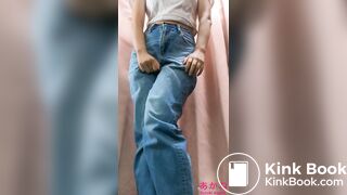 Big school girl peeing in jeans