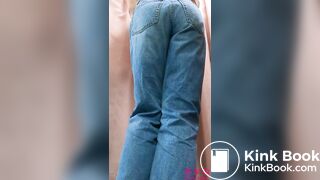 Big school girl peeing in jeans