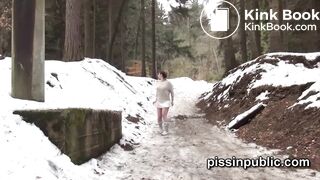 Girls in need skate around in the snow to find a proper place to have a pee