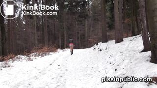 Girls in need skate around in the snow to find a proper place to have a pee
