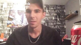 Guy pooping in his cap