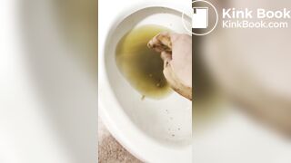 Smelly gal scoops her poop from the shower water