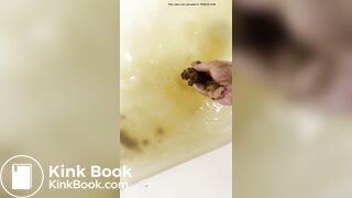 Smelly gal scoops her poop from the shower water