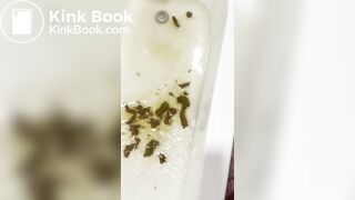 Smelly gal scoops her poop from the shower water