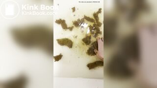 Smelly gal scoops her poop from the shower water