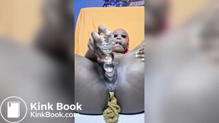 Ebony stuffs pussy with shit Xymz