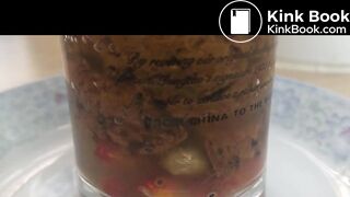 Pooping in front of a goldfish in a cup