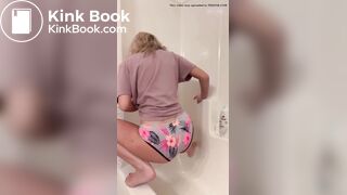 Blackras poops her panties squatted over bathtub