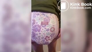 Diaper Girl messes diaper