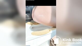 A plump buttock defecating on the toilet.