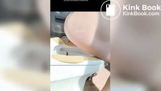 A plump buttock defecating on the toilet.