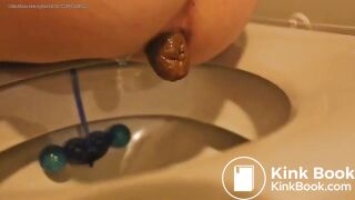 She poops in the toilet