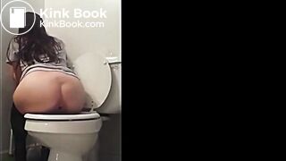 Constipated pushing hard pepples on the toilet