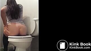 Constipated pushing hard pepples on the toilet