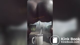 girl having diarrhea in a cup