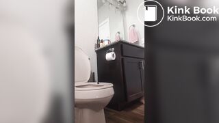 Girl in Hello Kitty pajamas standing over toilet