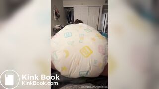 Girl messes diaper on daddy