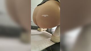 A girl defecated and urinated in a public toilet.