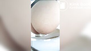 Chinese girl defecating and urinating in the toilet.