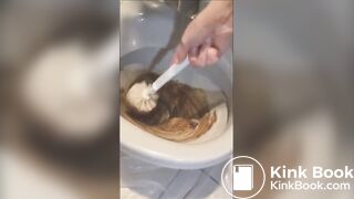 Eating her poop from toilet bowl