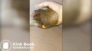 Girl puts hand into dirty glove