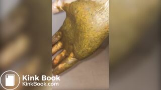 Girl puts hand into dirty glove