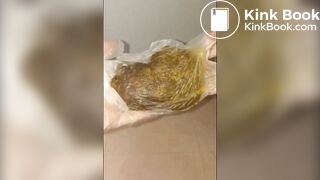 Girl puts hand into dirty glove