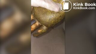 Girl puts hand into dirty glove