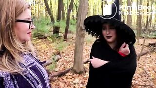 She sits in a cauldron